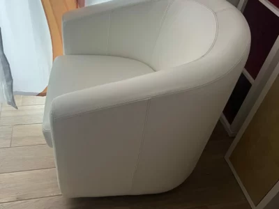 Poltrona girevole in pelle